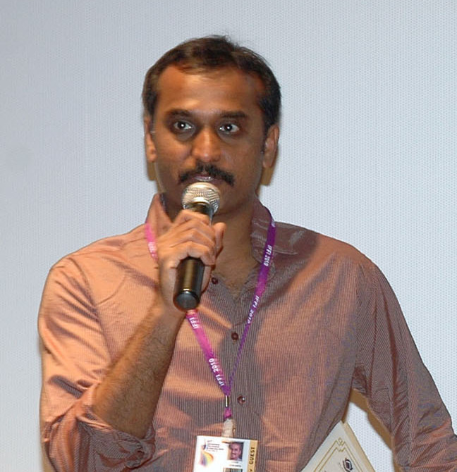 Portrait of Deva Katta speaking during the Prasthanam presentation at IFFI 2010 in Panaji, Goa.